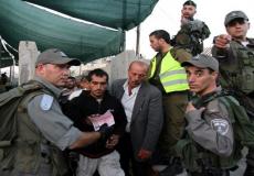 قوات الاحتلال اعتادت مضايقة العمال الفلسطينيين - أرشيف
