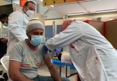 تطعيم لقاح كورونا للعمال الفلسطينيين