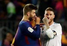 سرخيو راموس وجيرارد بيكيه قلبي دفاع كل من فريق ريال مدريد وفريق برشلونة