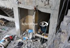 فلسطينية تطهو على انقاض منزلها المدمر في شمال قطاع غزة