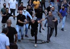 من الاعتداء على متظاهرين في رام الله
