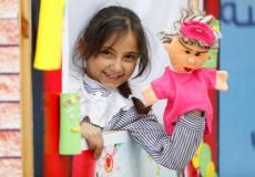 طالبة لدى الأونروا خلال مشاركتها في الأنشطة الترفيهية ضمن ألعاب صيف 2019  - تصوير محمد الحناوي.