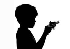 طفل يطلق النار ويقتل والدته - تعبيرية