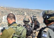 عناصر الجيش والشرطة الاسرائيلية قرب بؤرة أفيتار