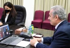 اشتية خلال لقاء وزيرة خارجية النرويج إين ماري إريكسن سوريد، عبر الفيديو