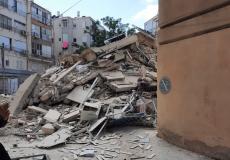 المبنى بعد انهياره