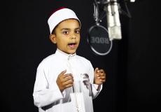 طفل ينشد - صورة أرشيفية