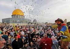 فلسطينيون يحنفلون بحلول عيد الفطر - توضيحية