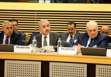 اشتية خلال مشاركته باجتماع الدول المانحة في بروكسل