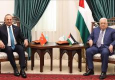 الرئيس عباس خلال لقاء وزير الخارجية التركي