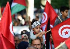 أعلام تونس وفلسطين - توضيحية