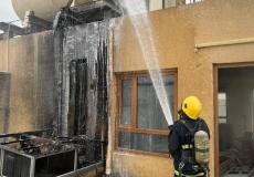 اخماد حريق في مصرف بالعراق.