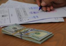 إنهاء خلافات مالية بقيمة 24 ألف و400 دولار