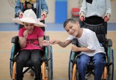 البنك الوطني ومؤسسة خيرية بالقدس يوقعان اتفاقية لدعم أطفال من ذوي إعاقة