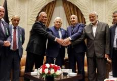 لقاء الرئيس الفلسطيني محمود عباس مع رئيس المكتب السياسي لحركة حماس اسماعيل هنية مع الرئيس الجزائري - ارشيف