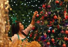 حكم التصوير بجانب شجرة الكريسماس