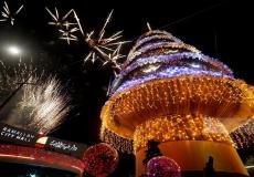 جانب من الاحتفال بإضاءة شجرة الميلاد في رام الله