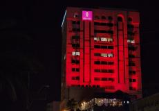 بنك فلسطين يُضئ مبنى مقره في غزة بألوان العلم المغربي