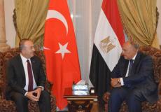 وزير الخارجية المصري شكري ونظيره التركي اوغلو