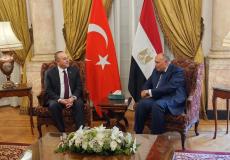 وزير الخارجية المصري شكري ونظيره التركي اوغلو
