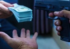 سطو مسلح على أحد البنوك في رام الله وسرقة مبلغ مالي