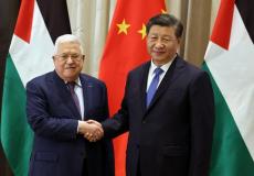 الرئيس محمود عباس خلال لقائه نظيره الصيني شي جين بينج