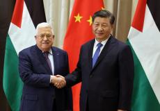 الرئيس الفلسطيني محمود عباس مع الرئيس الصيني شي جين بينغ