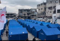 "الهلال الأحمر" تُنشئ مخيمات لإيواء النازحين العائدين إلى غزة وشمالها