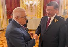 الرئيس عباس خلال لقائه الرئيس الصيني