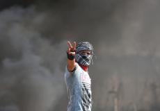 ارتداء اللثاء في الضفة - تعبيرية