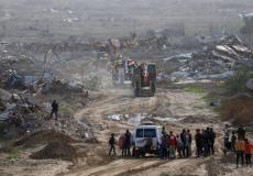 الصليب الأحمر وعناصر القسام شرق مدينة غزة