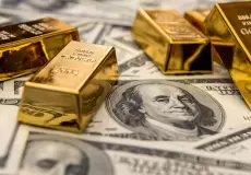 الدولار والذهب - تعبيرية