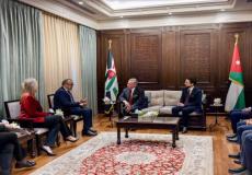 ملك الأردن مع مدير عام منظمة الصحة العالمية