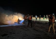 من القصف على مركبة في شارع الرشيد غرب غزة
