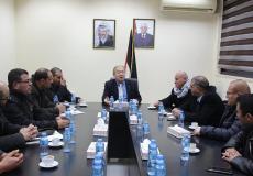 وزير الاقتصاد الوطني الفلسطيني مع مصدري التمور والأعشاب الطبية خالد العسيلي 