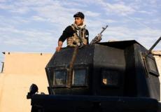 جندي عراقي يشارك في عملية استعادة الموصل من داعش 