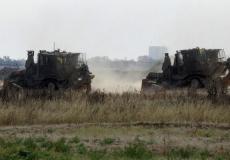 آليات الاحتلال تتوغل وتجرف أراضي شرق غزة- أرشيفية