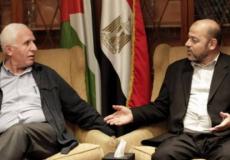 موسى أبو مرزوق وعزام الأحمد