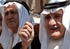 لاجئون فلسطينيون يحملون مفتاح العودة