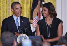الرئيس السابق اوباما و زوجته