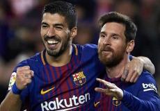 نجما برشلونة ليونيل ميسي ولويس سواريز