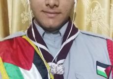طالب من غزة يمثل فلسطين في المخيم الكشفي العربي