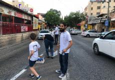 مشروع بلد ينفذ حملة زجاجات الماء والتمر على السائقين بالناصرة  