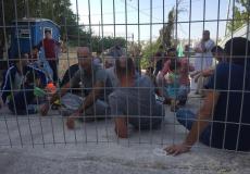  عشرات المواطنين من سكان حي تل ارميدة في مدينة الخليل   في الوقفة الاحتجاجية التي نظمت ردا على سياسة سلطات الاحتلال الإسرائيلي