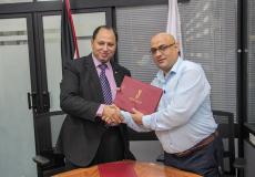 توقيع اتفاق بين شركة الكهرباء والكلية الجامعية