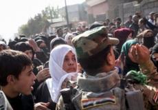 مدنيون يحاولون الخروج من أحياء الموصل الشرقية