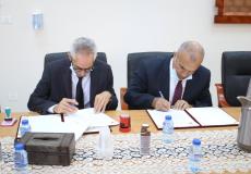 وكيل وزارة التنمية الاجتماعية داوود الديك والمدير العام للمؤسسة الوطنية الفلسطينية للتمكين الاقتصادي باسم دودين