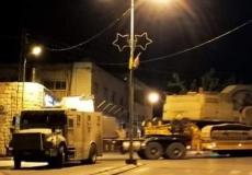 حملة دهم واسعة بالضفة وهدم منزل شهيد في بزاريا بنابلس