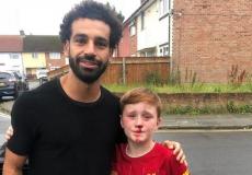 محمد صلاح مع مشجع ليفربول الصغير