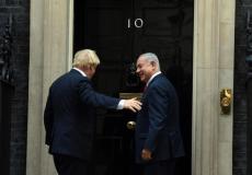 نتنياهو وجونسون في لقاء سابق 